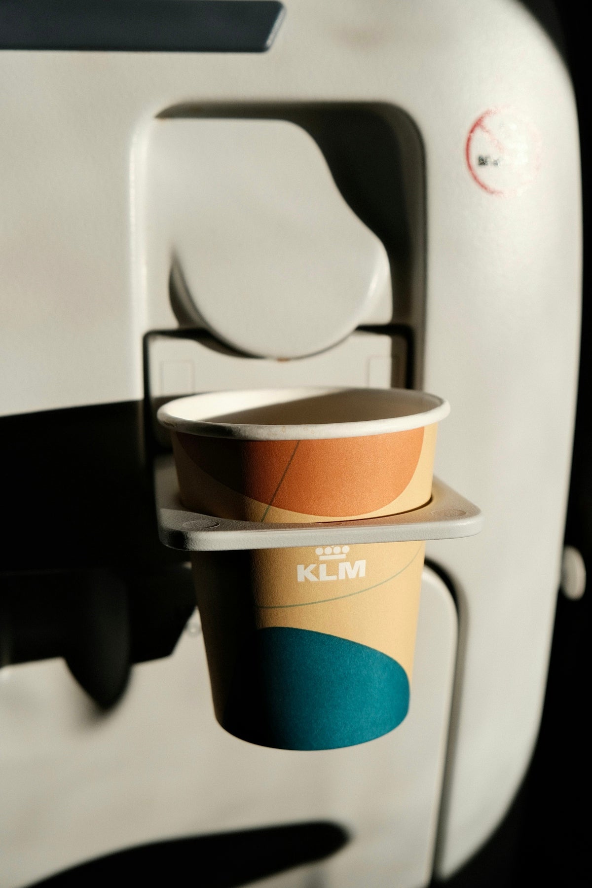 Klm branded cups on a dispenser
