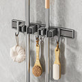Broom Holder Wall Mount Movable Hooks and Clips Mop and Broom Hanger Wall by Unknown